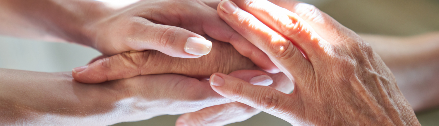 Hände halten als Symbol für Beistand und Anteilnahme